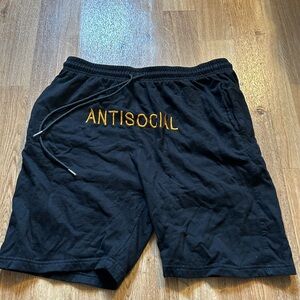 Black Athletic Shorts with Elastic Waistband and Textured Fabric